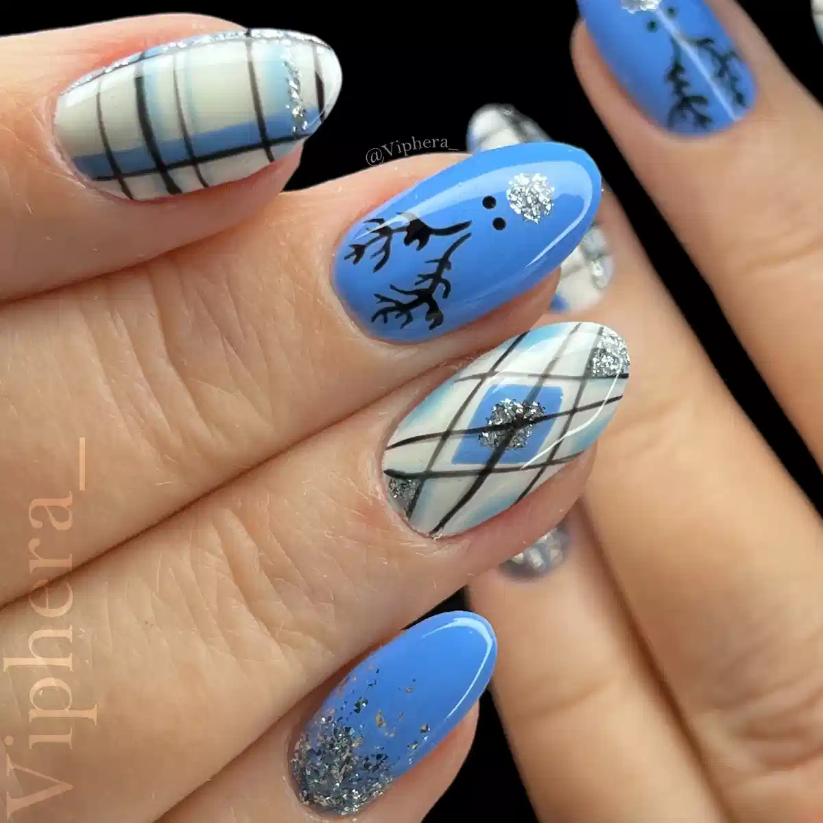 Blue and monochrome plaid mix with black line art and silver glitter accents