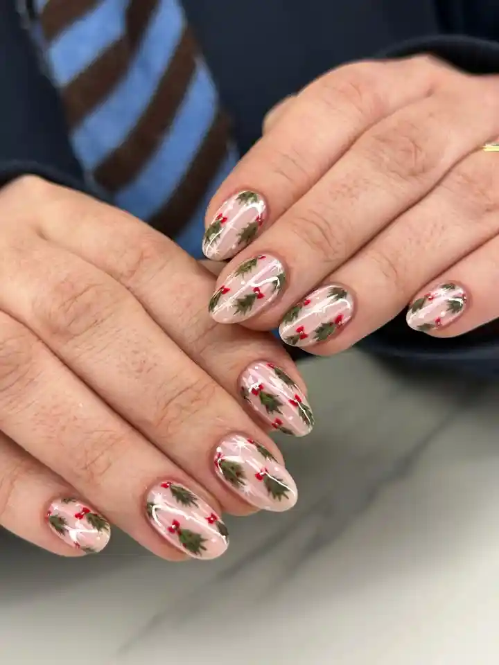 Nude base with repeating green leaf and red berry pattern