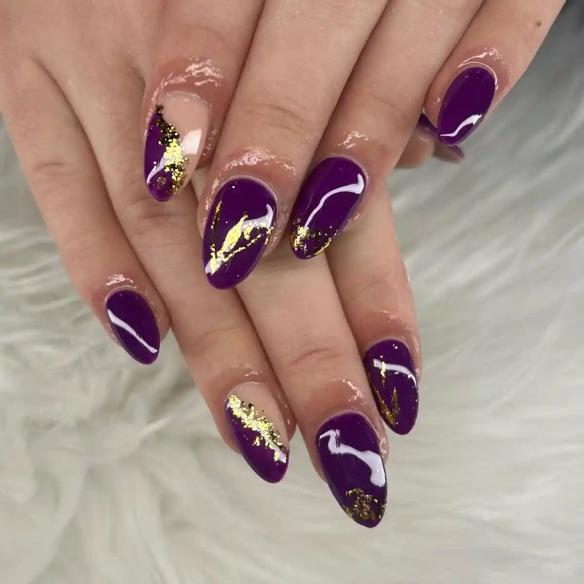 Glossy deep purple with scattered gold foil accents