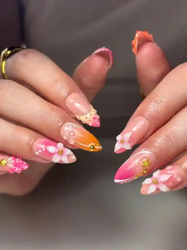 Pink-orange gradients with 3D white flowers and gold charms