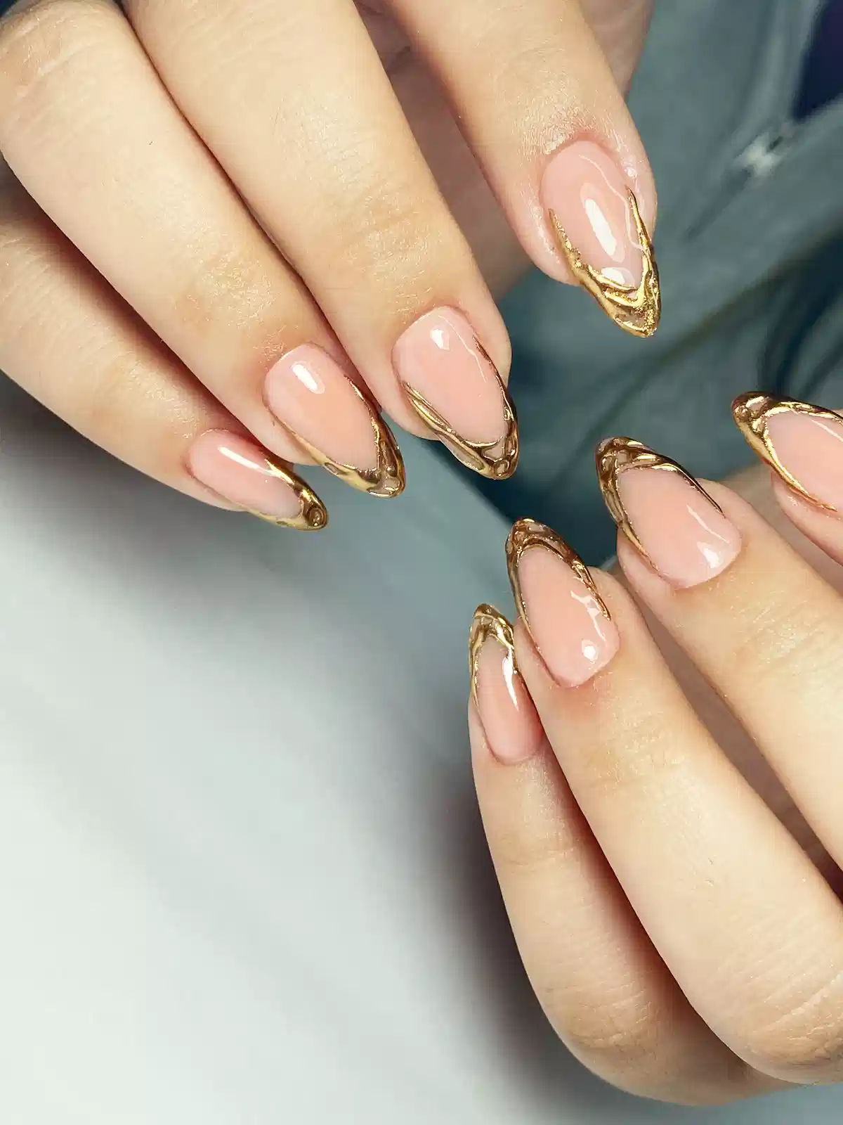 Sculpted Gold-Edged Almond Nails
