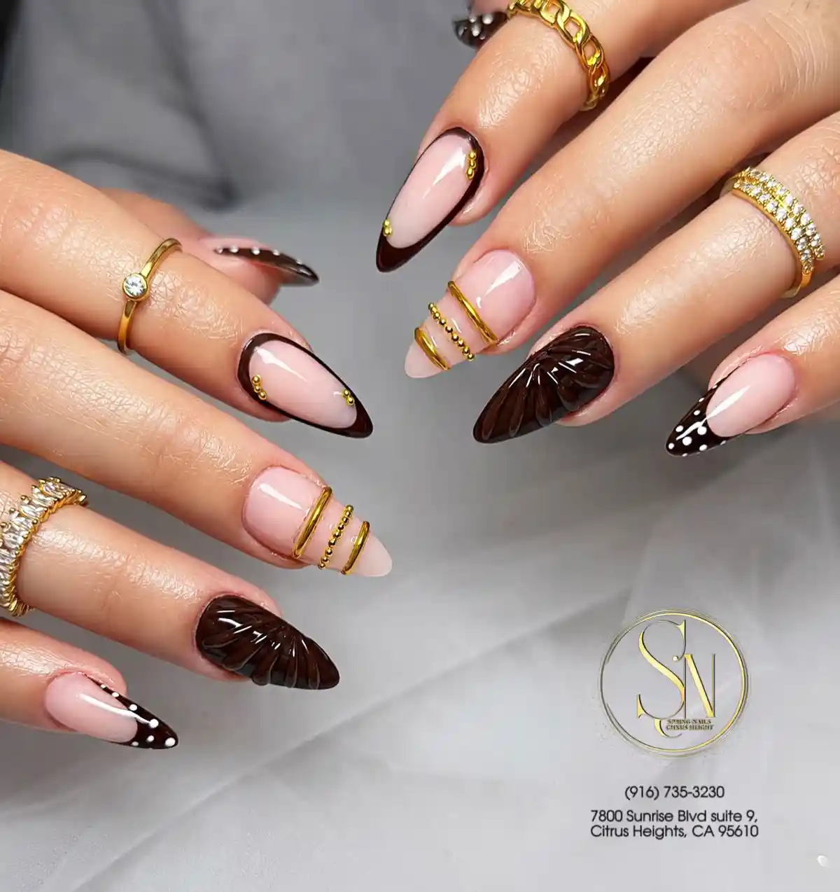 Nude and Dark Almond Nails with Gold Band Accents