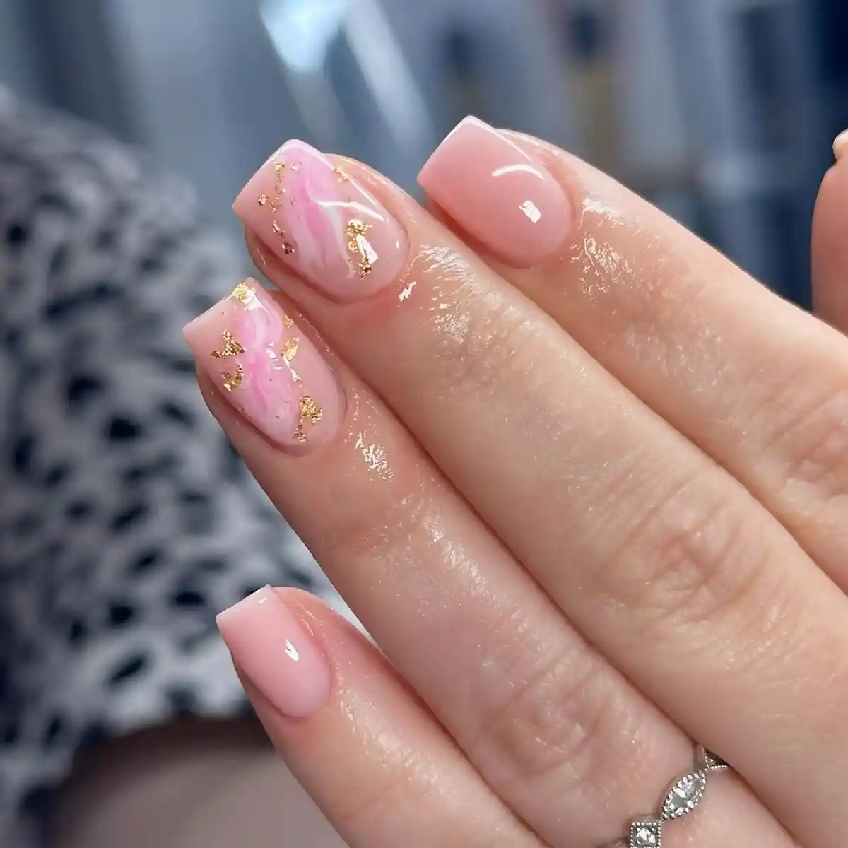 Soft pink squares with marbled accents and small gold foil pieces