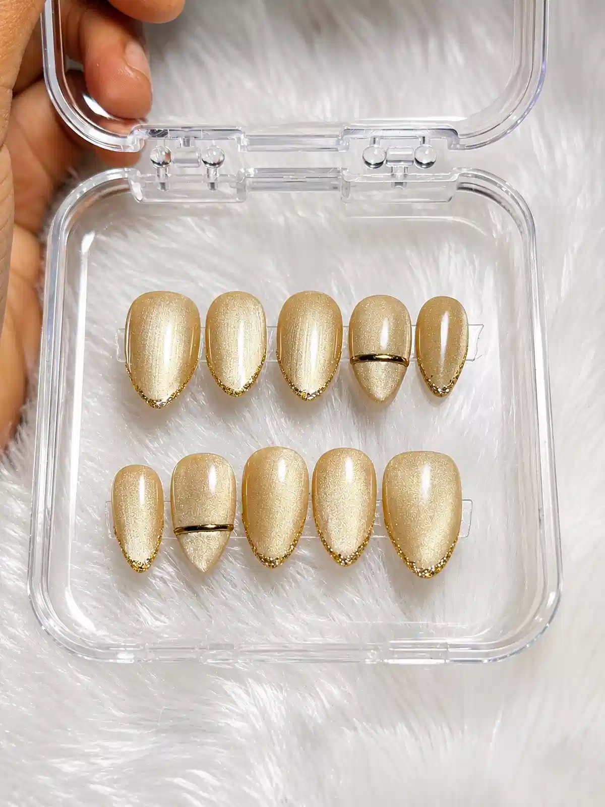 Gold shimmer set with fine glitter and band accents