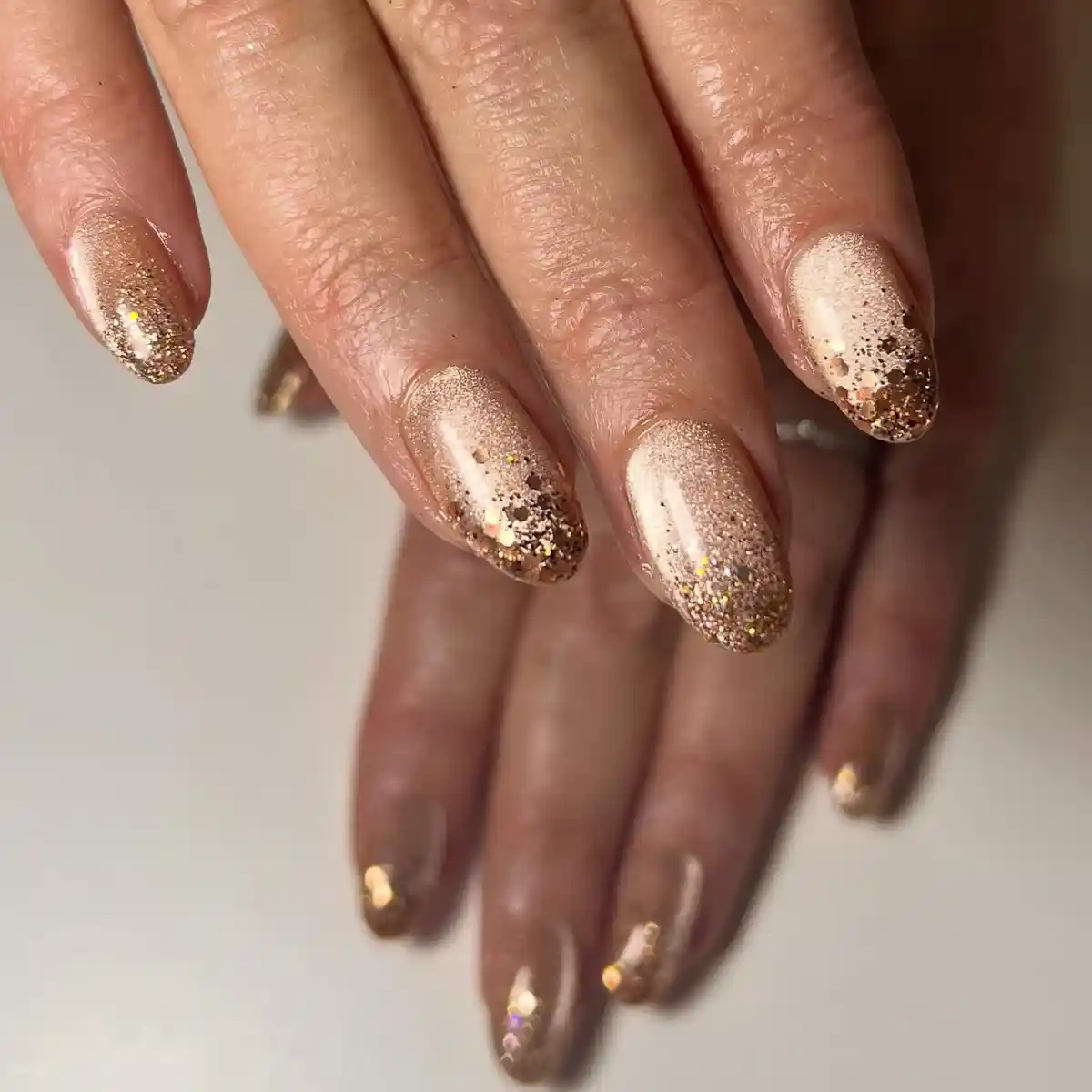 Gold shimmer with glitter-dipped tips