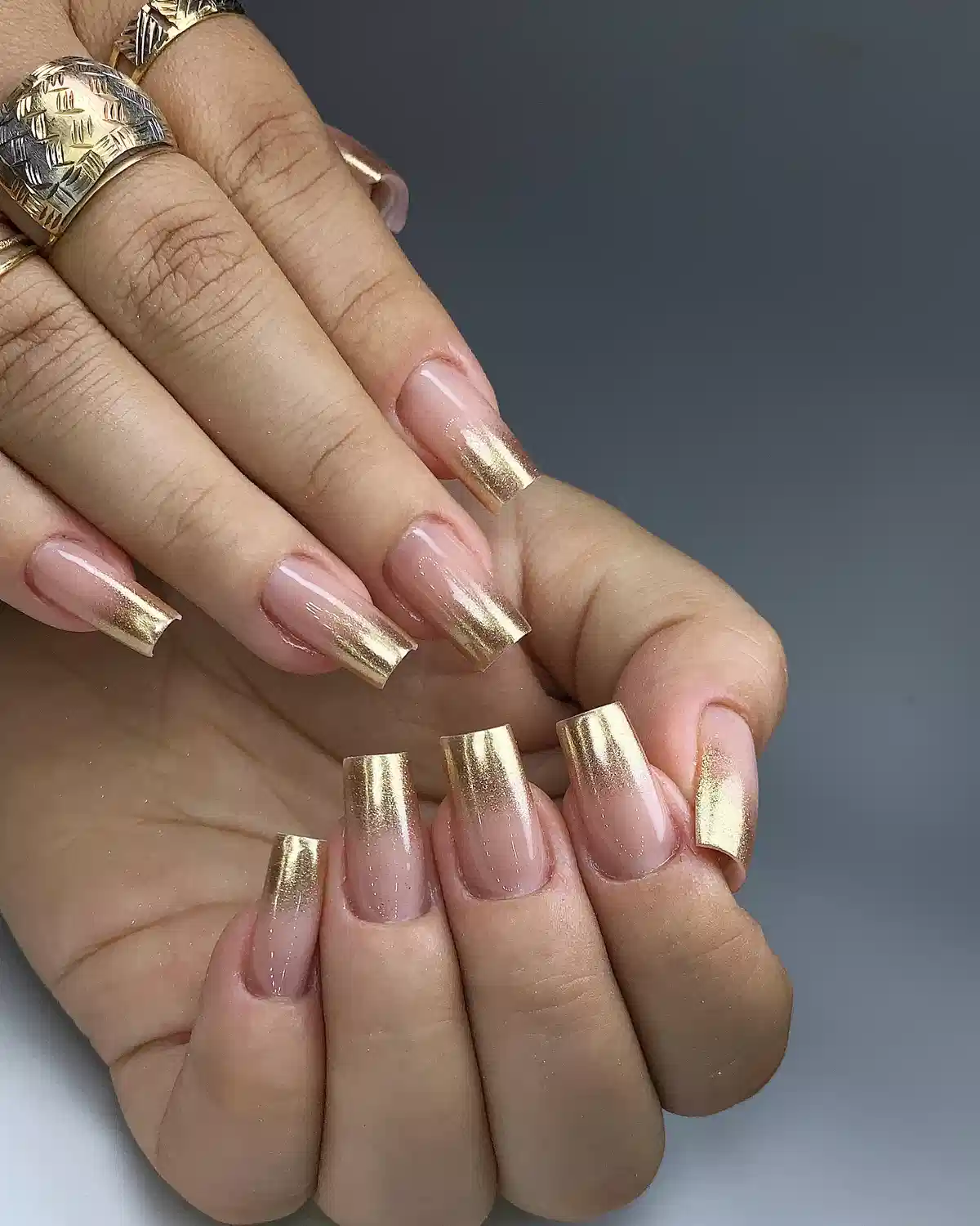 Metallic gold gradient tips on nude base