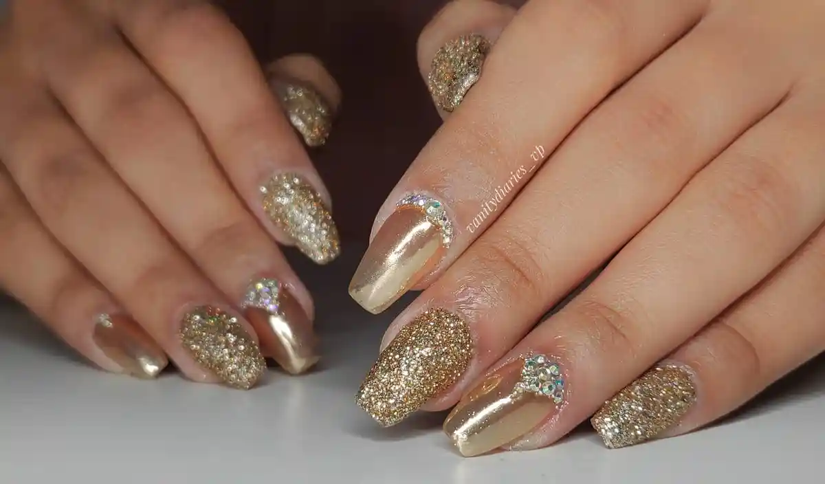 Gold glitter and metallic mix with rhinestone cuticle arcs