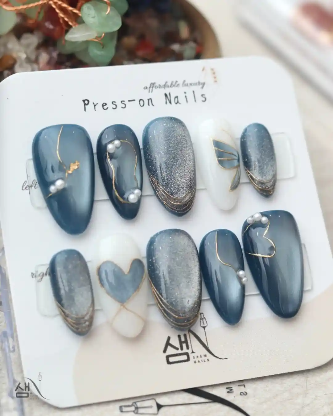 Blue-gray and silver set with pearl accents and heart detail