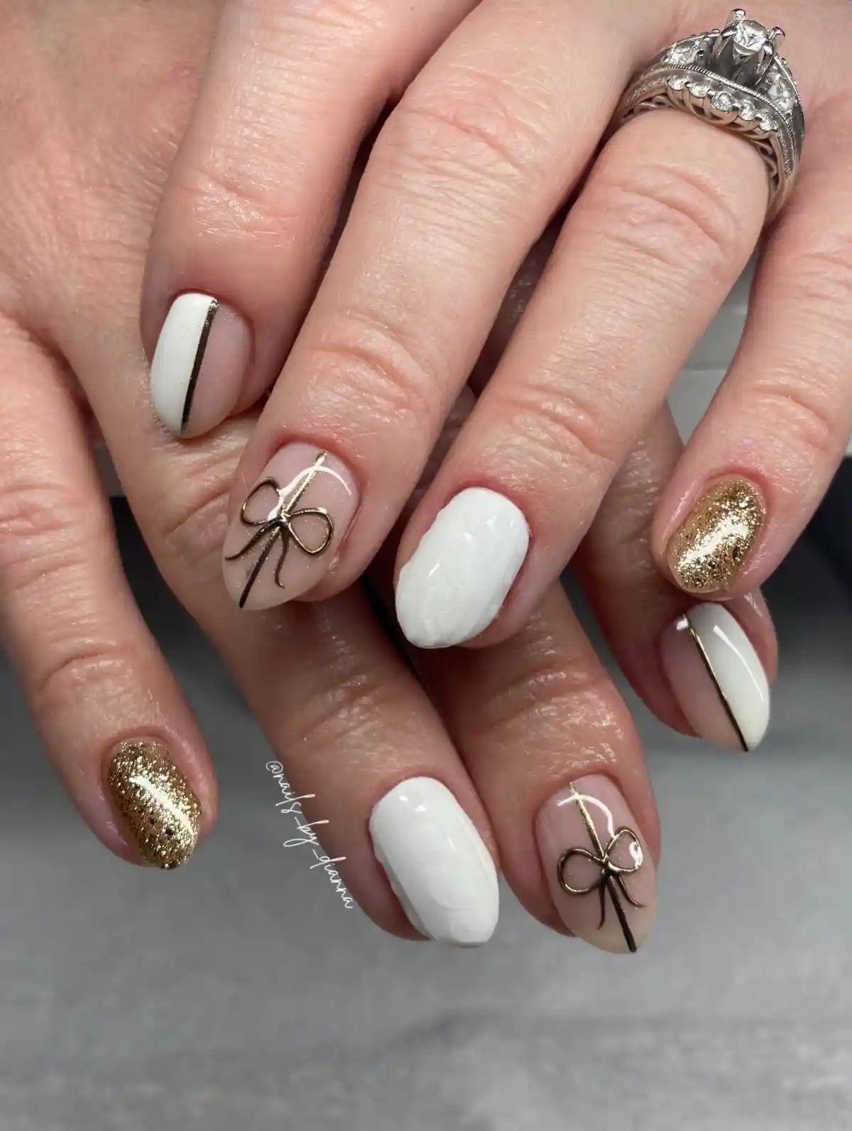 Oval white-and-gold mix with bow line art and glitter accents