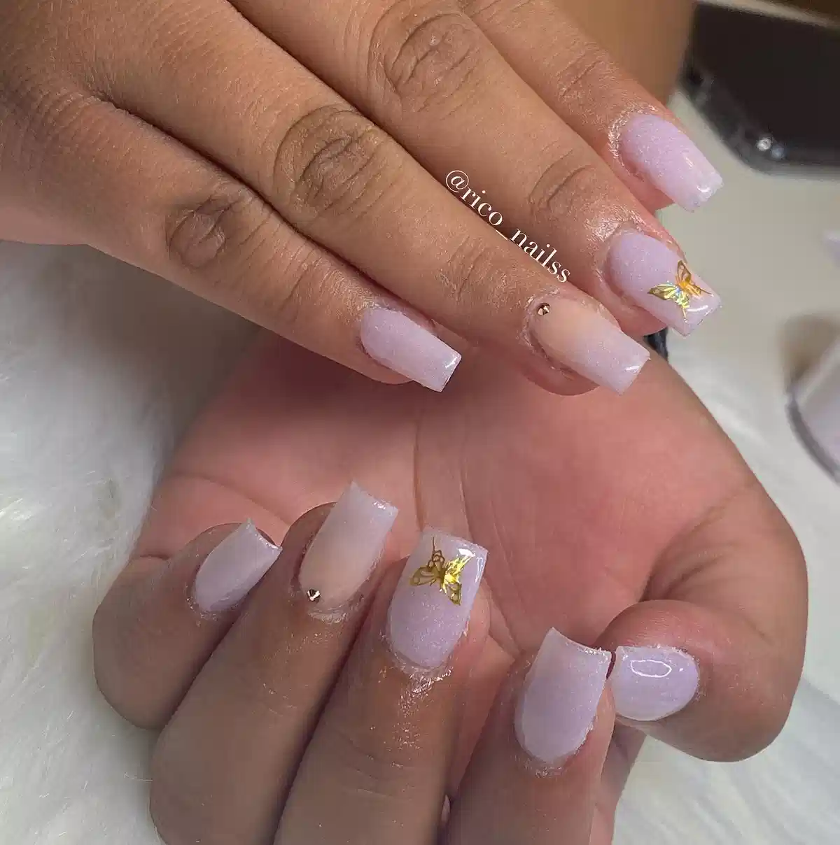 Soft lavender squares with a gold stud and bee accent