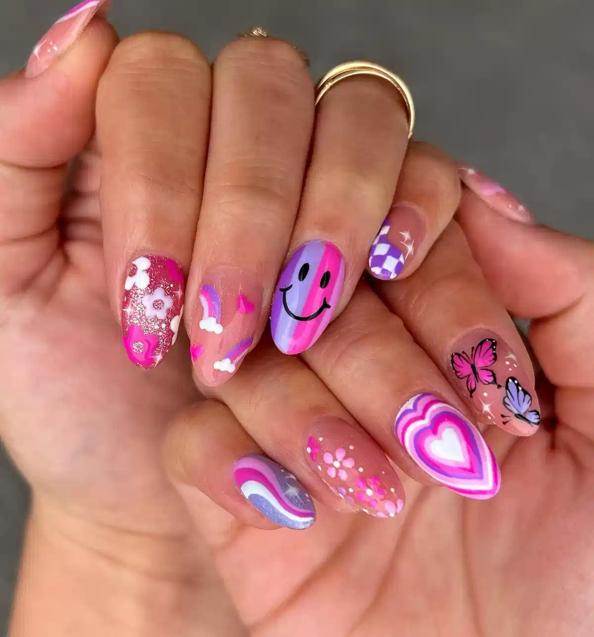 Playful mixed designs: smiley, checker, hearts, and butterflies