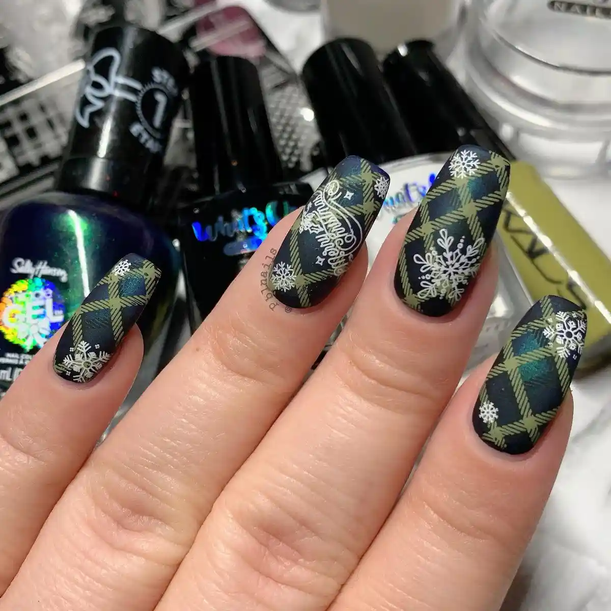Matte green-on-dark plaid with snowflakes and lettering
