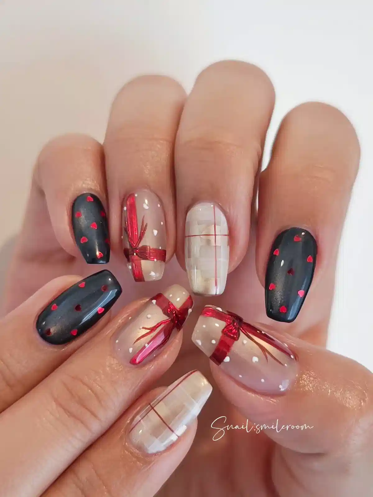 Gray hearts with gift-ribbon accents and thin red grid