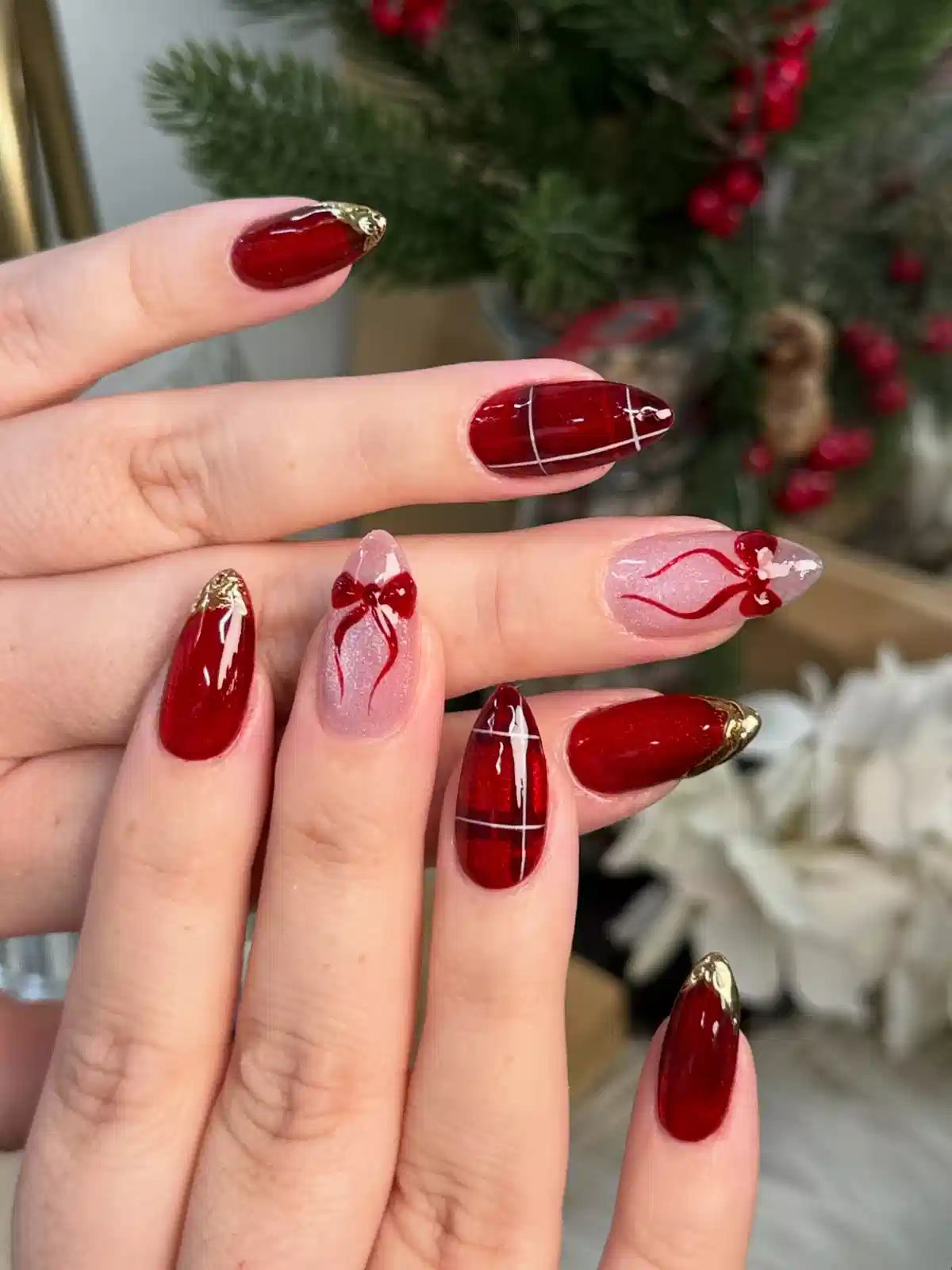 Deep Red Nails with Thin White Plaid Lines and Bow Accents
