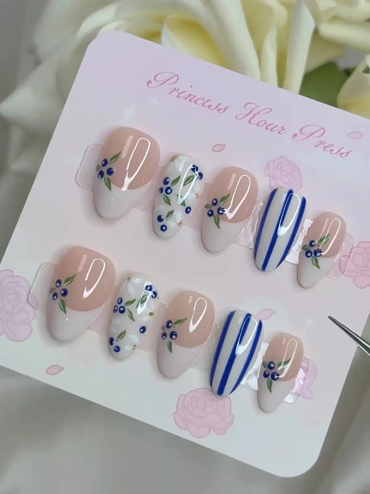 Blue-berry motif French tips with blue striped accents