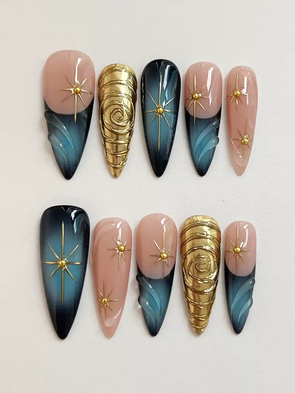 Starburst motifs with gradient blues and raised gold textures