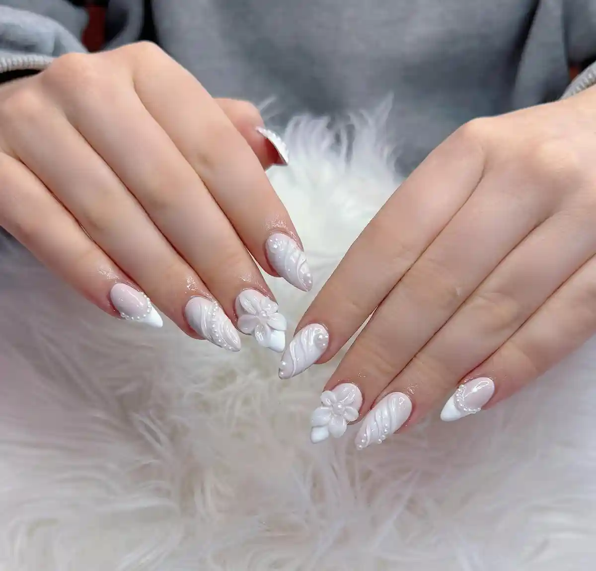 All-white raised swirl design with 3D flowers