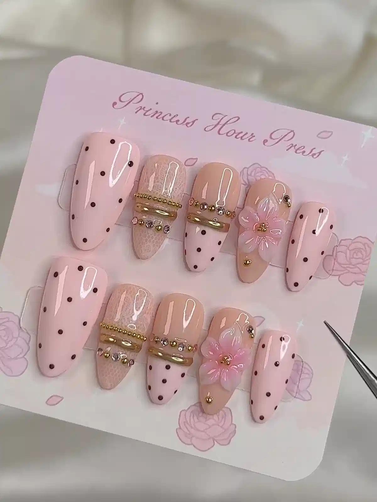 Pink polka-dot set with gold band accents and raised floral detail