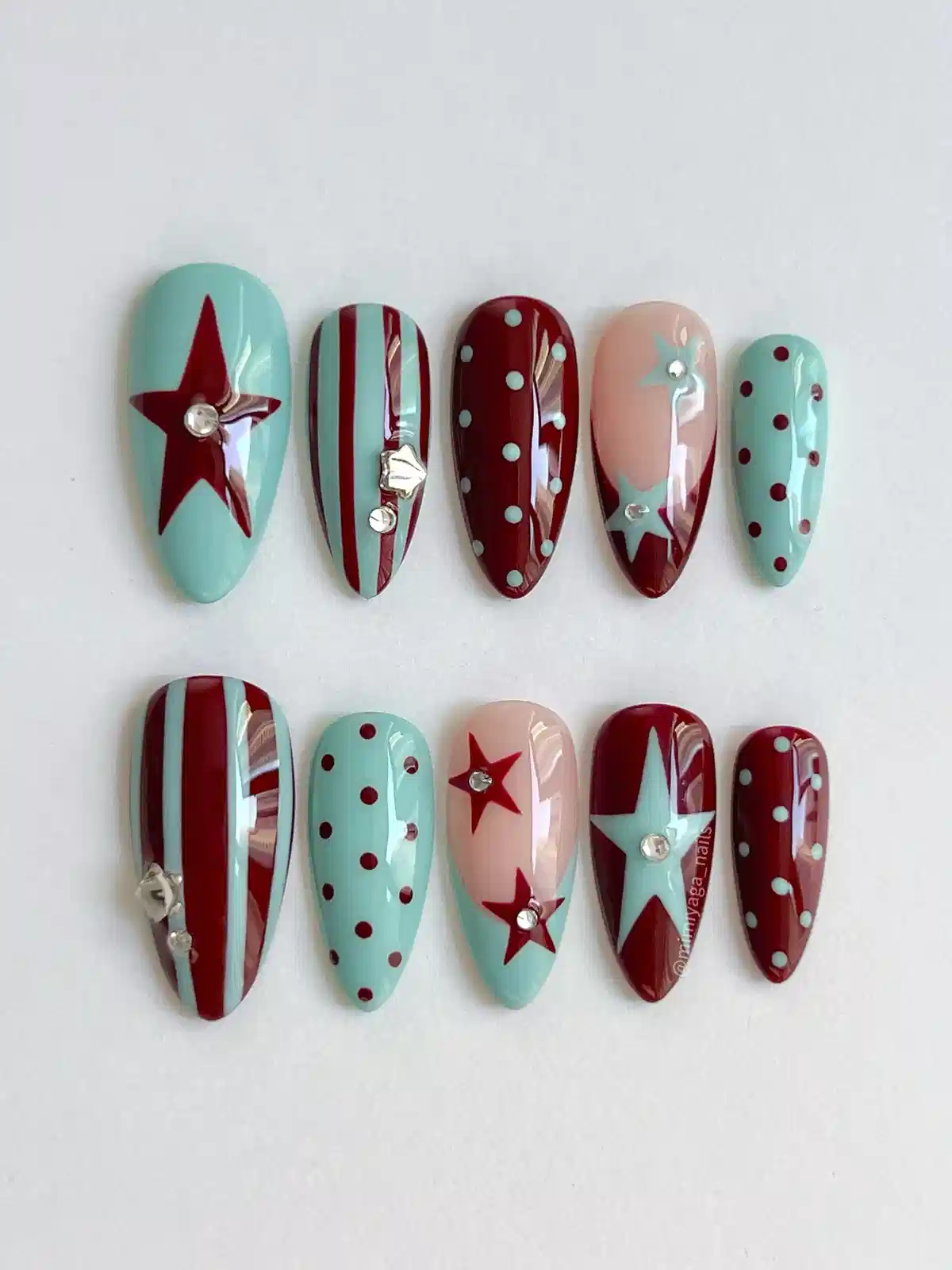 Mint and burgundy graphic set with stars, stripes, and dots
