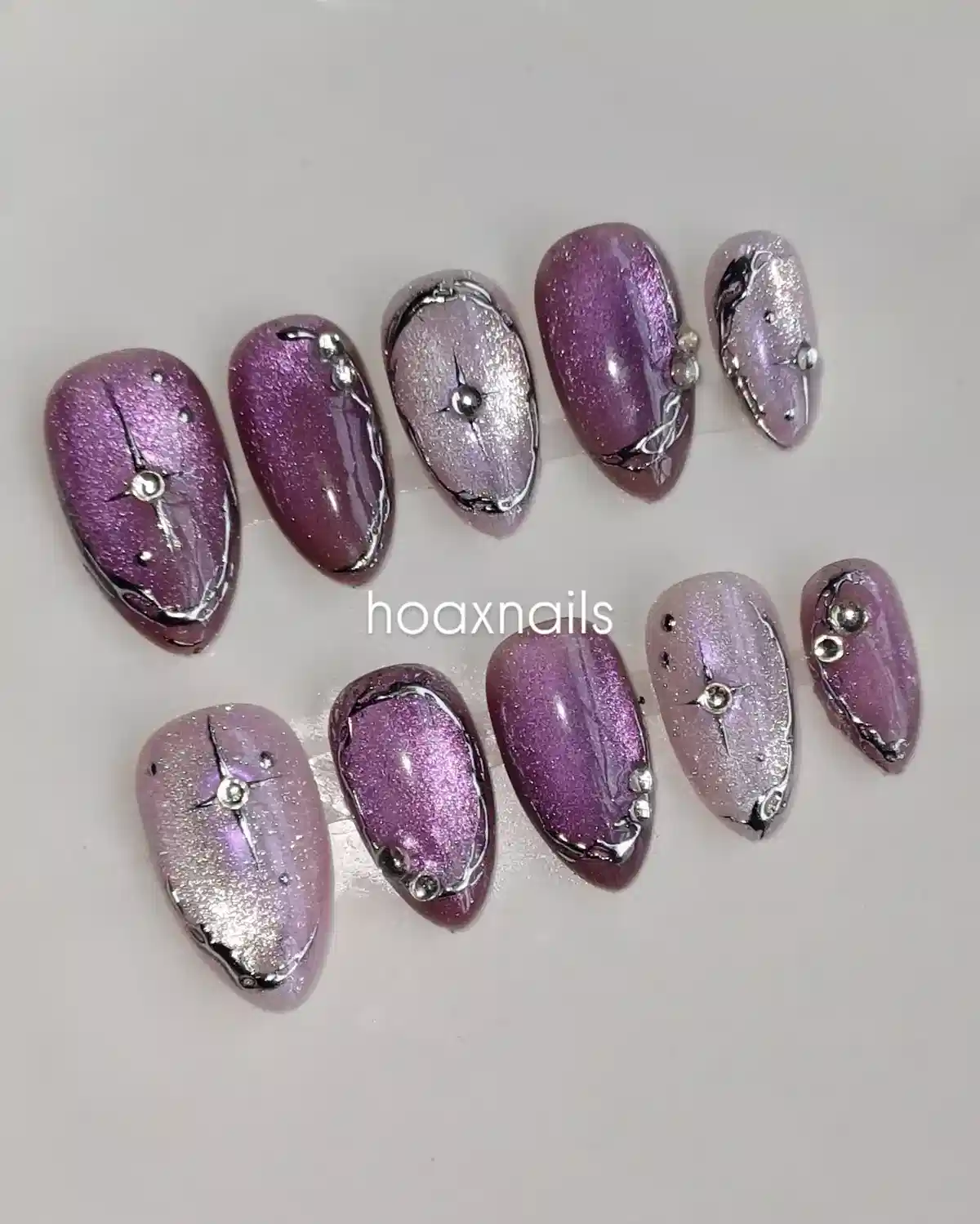Purple and silver shimmer set with raised metallic lines