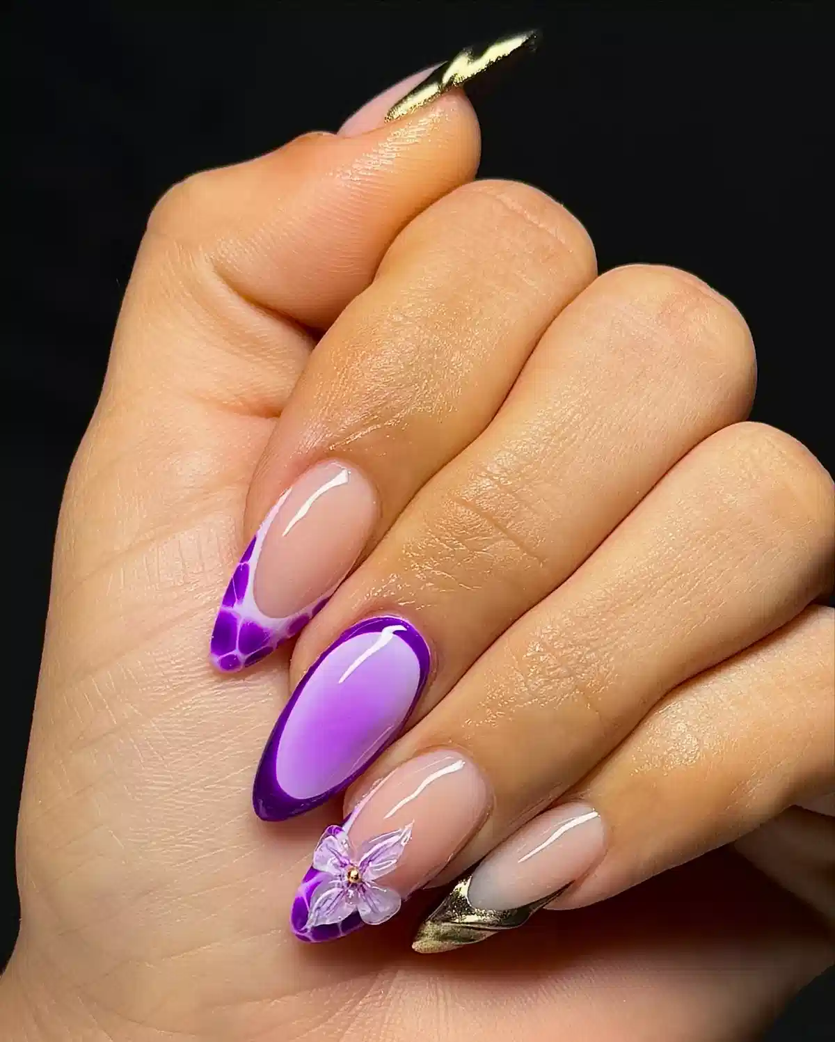 Nude base with purple tips and a 3D flower accent