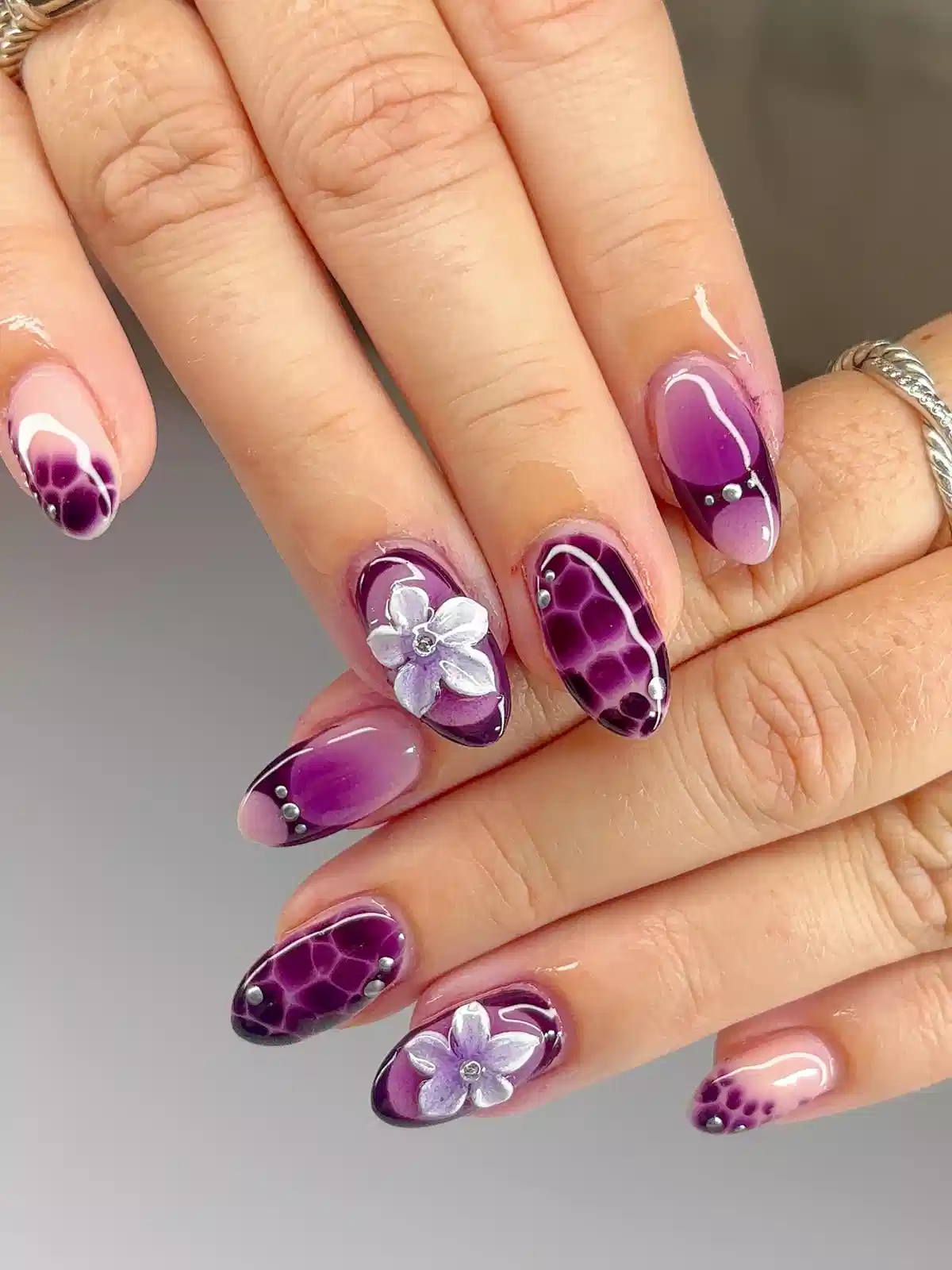 Purple gradient with cell pattern and 3D flowers