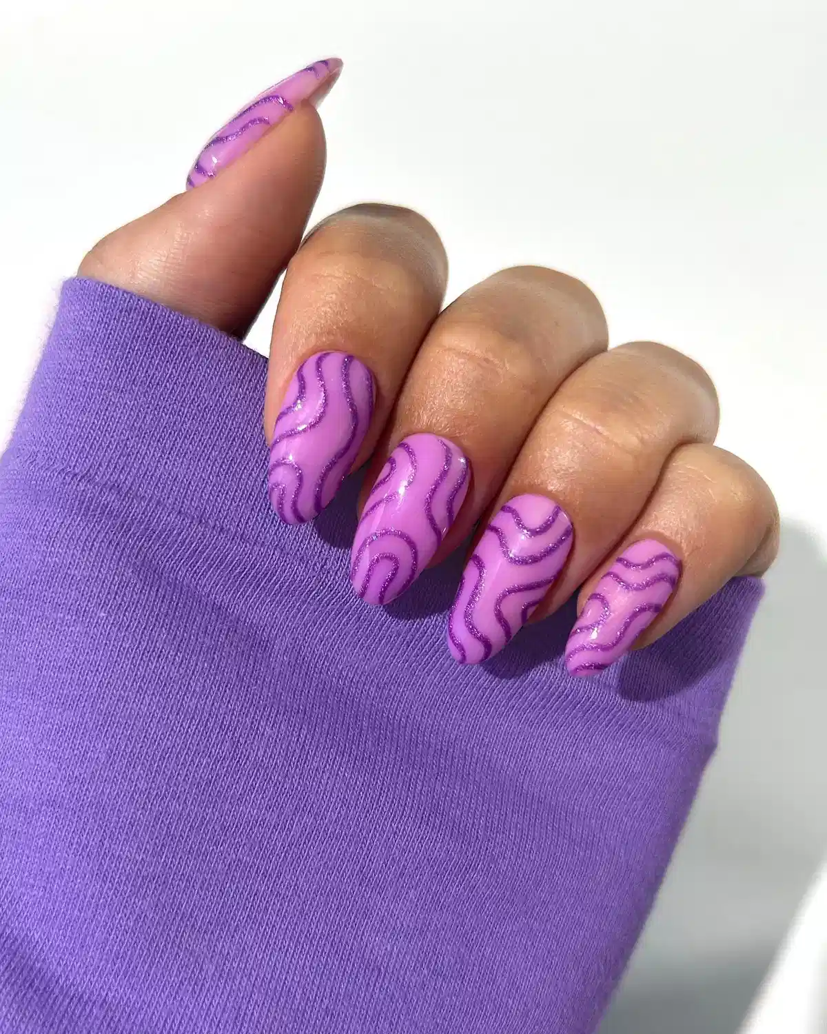Lavender base with darker purple wavy lines