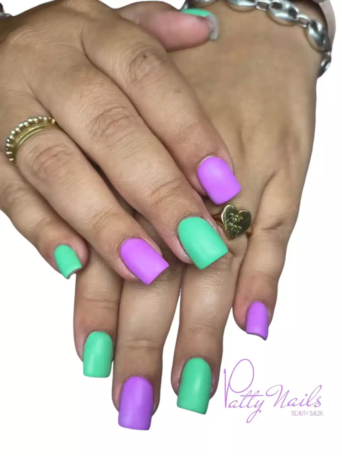 Matte mint green and lavender alternating nails