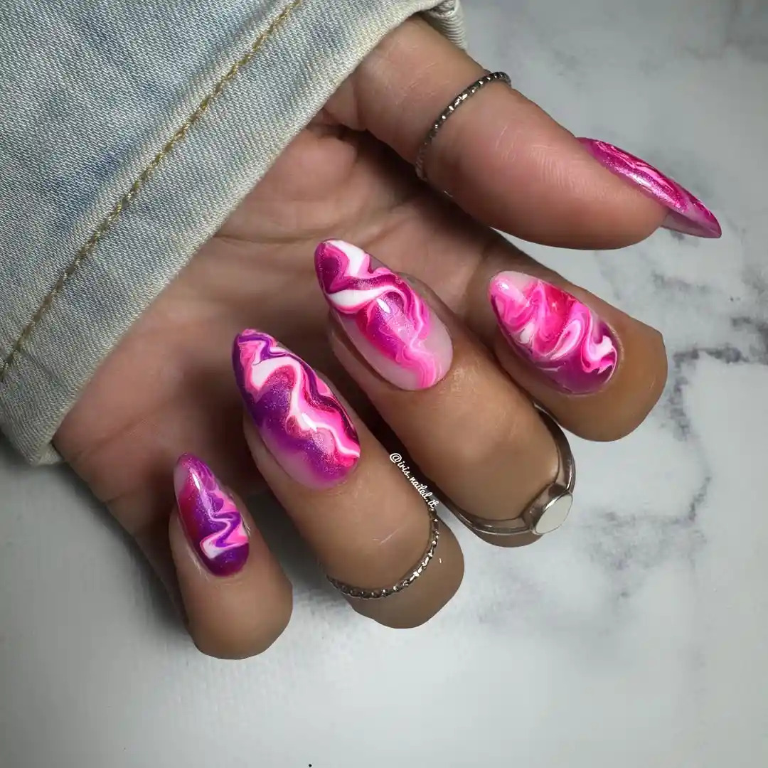 Pink and purple swirl marble nails