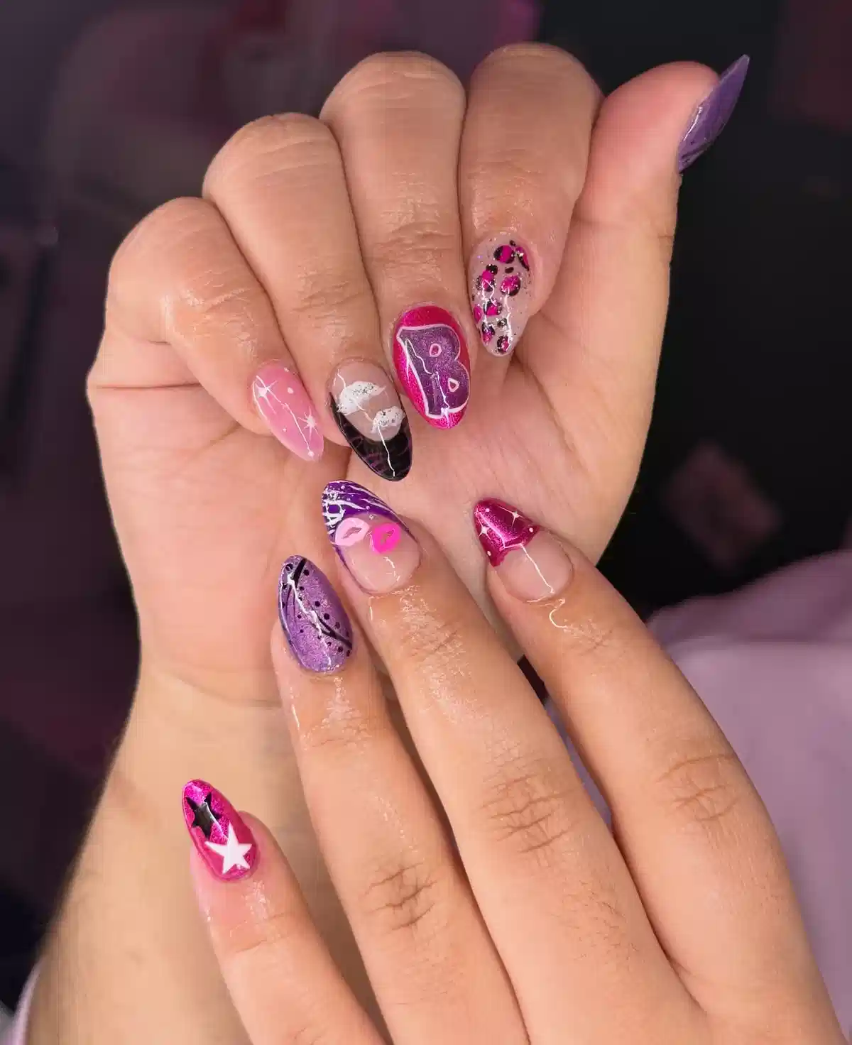 Graphic pink-and-purple set with letter accent and star detail