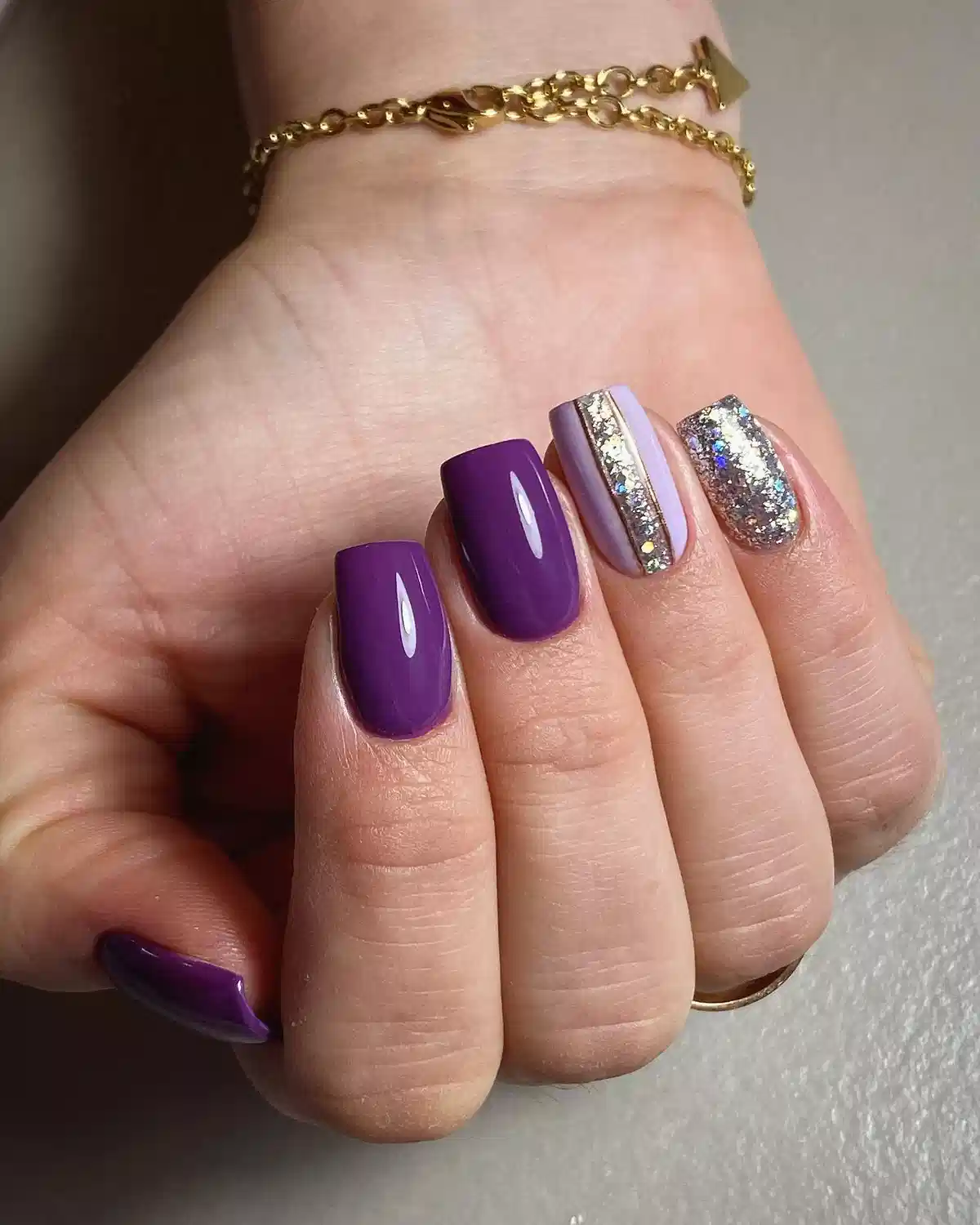 Solid purple with striped silver-glitter accent and full glitter nail