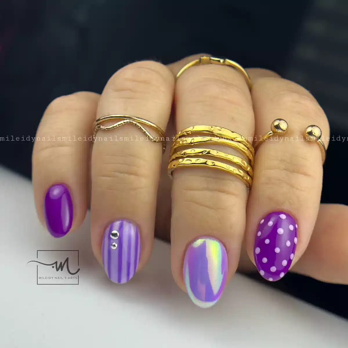 Purple solids, stripes, polka dots, and iridescent accent