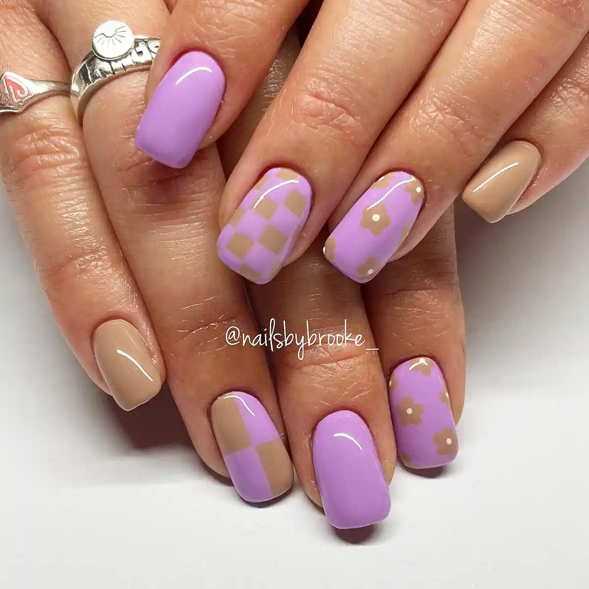 Lavender and tan checkerboard with simple flower accents
