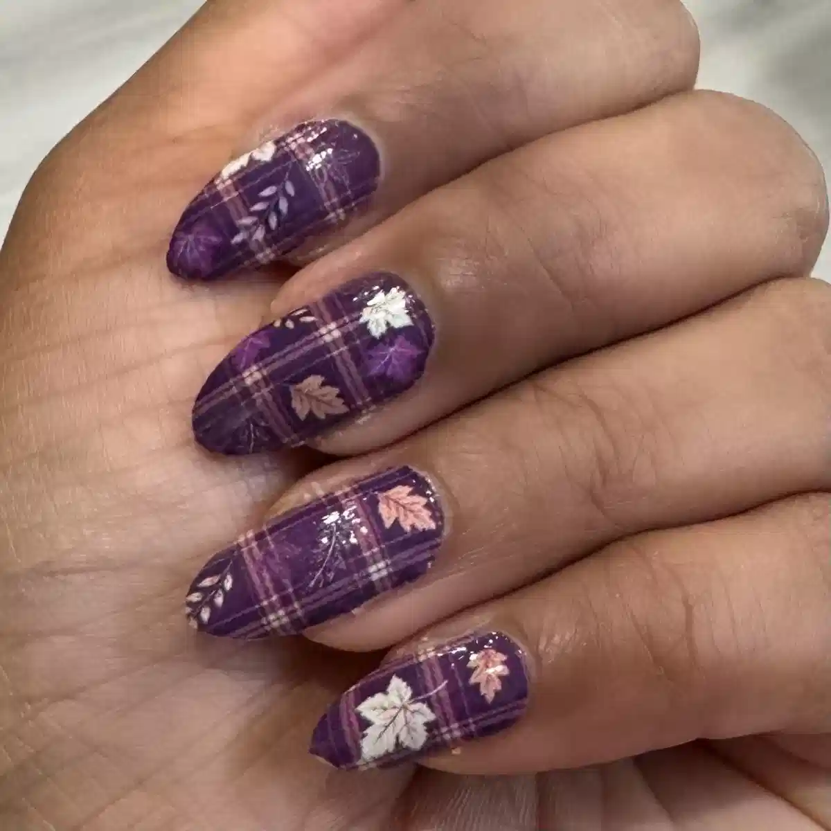 Deep purple plaid with leaf motifs