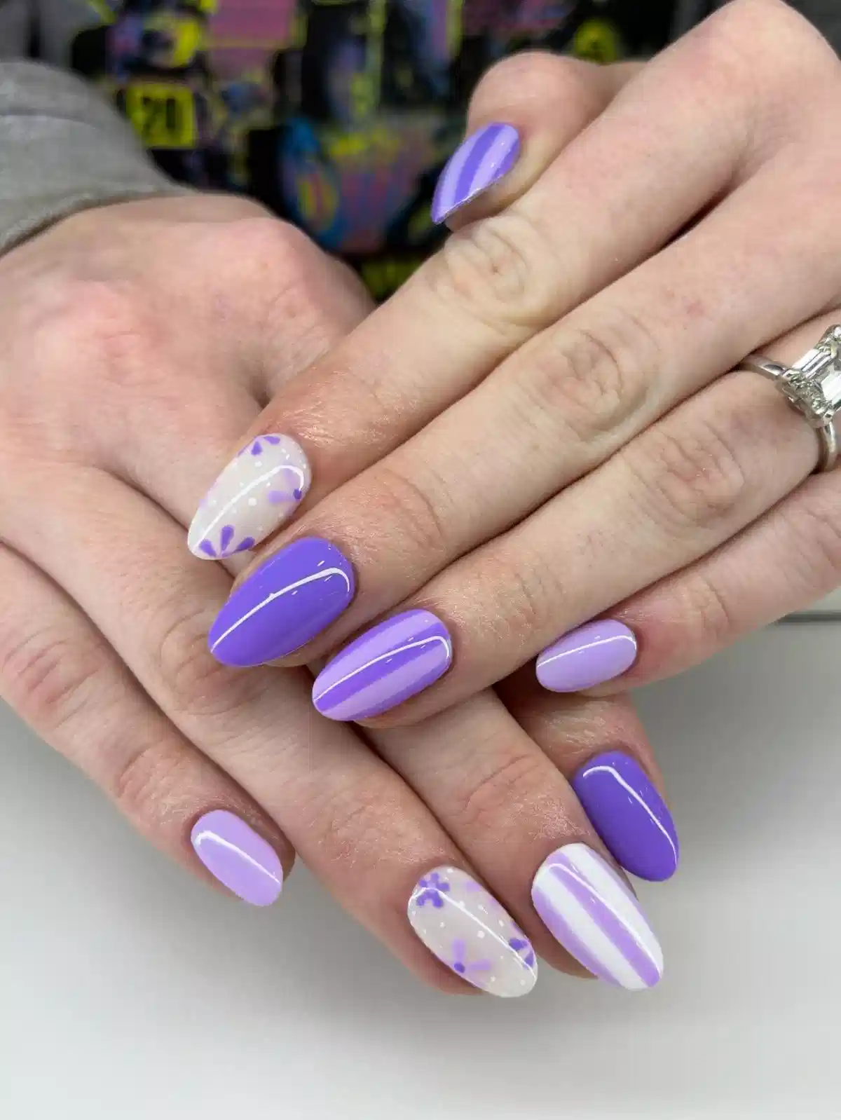 Purple solids with scattered petal accents and stripes