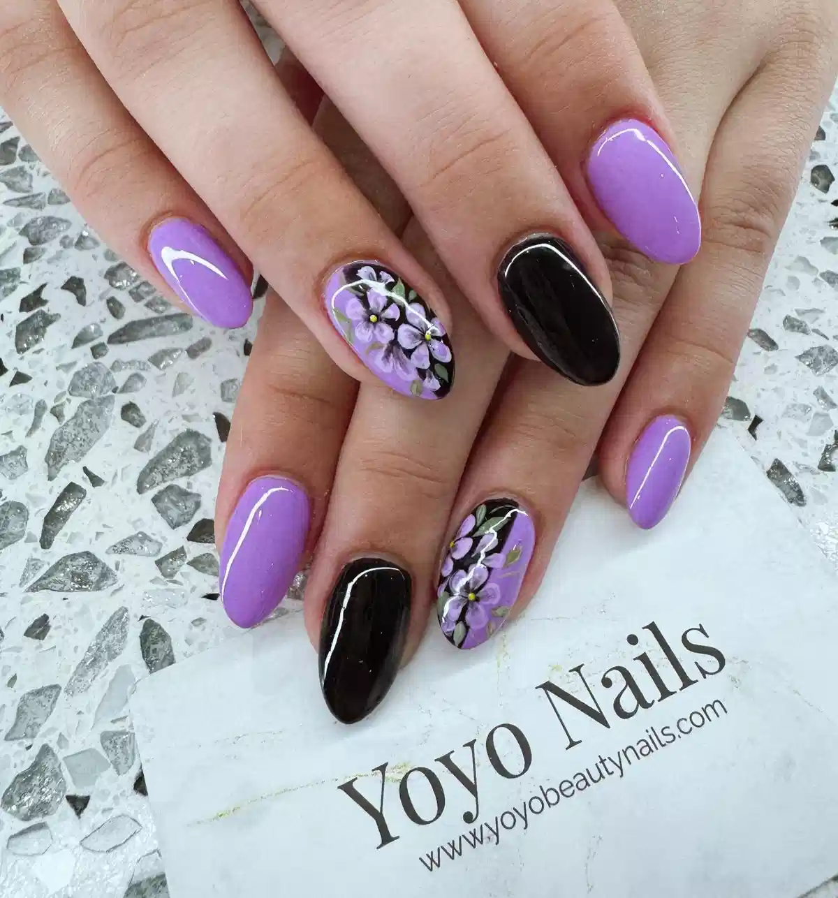 Lavender and black set with painted purple flowers and green leaves