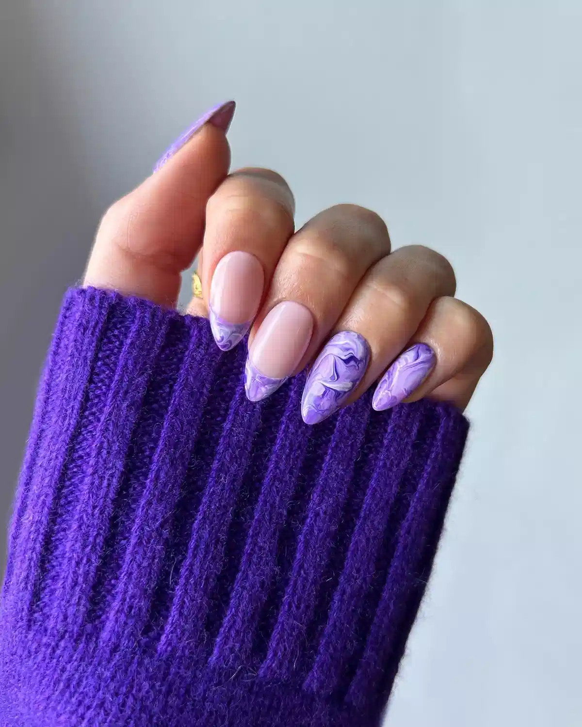 Nude base with purple marbled tips