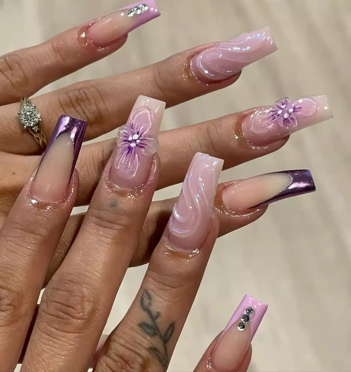 Glossy nude-and-purple set with raised floral accents