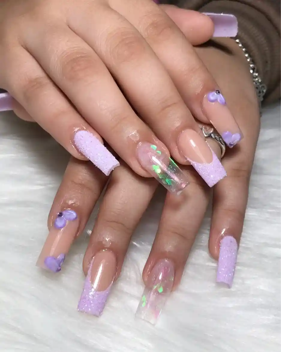 Lavender textured tips with clear iridescent accents and small 3D flowers