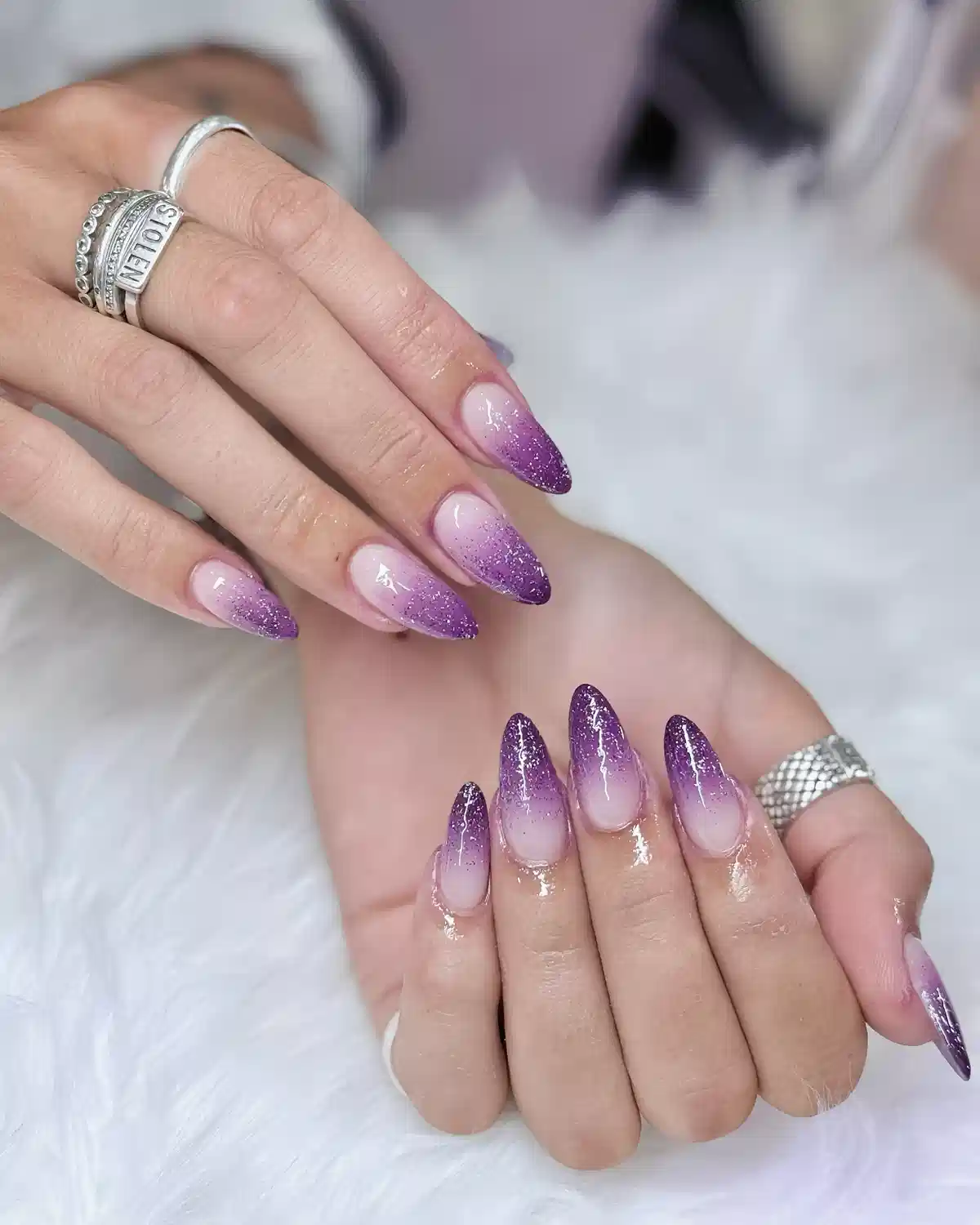 Purple glitter ombré almond nails