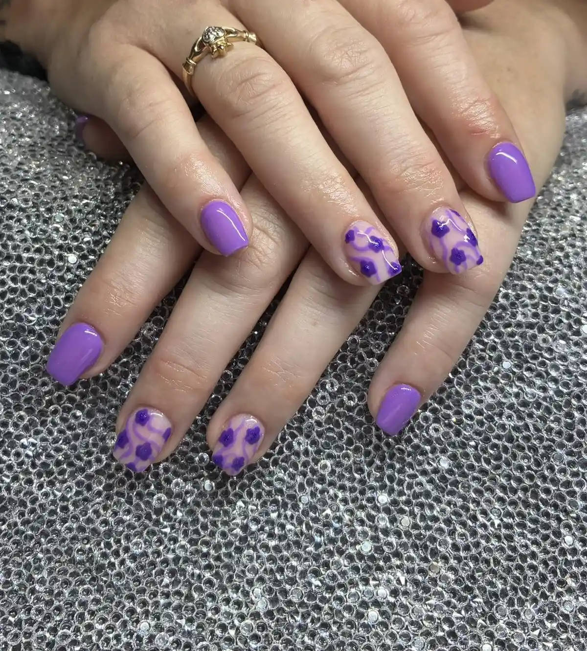 Solid purple with floral-and-wavy nude accents