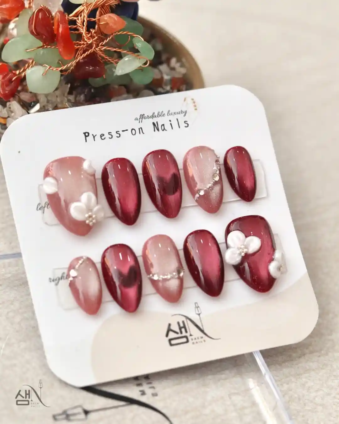 Red and nude floral press-on set with rhinestone curve