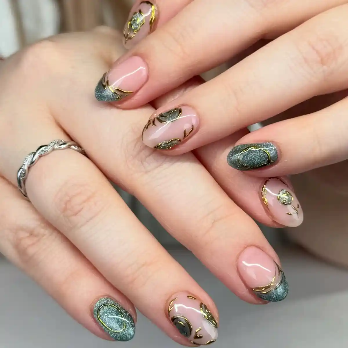 Nude and Dark Green Glitter with Gold-Outlined Abstract Accents