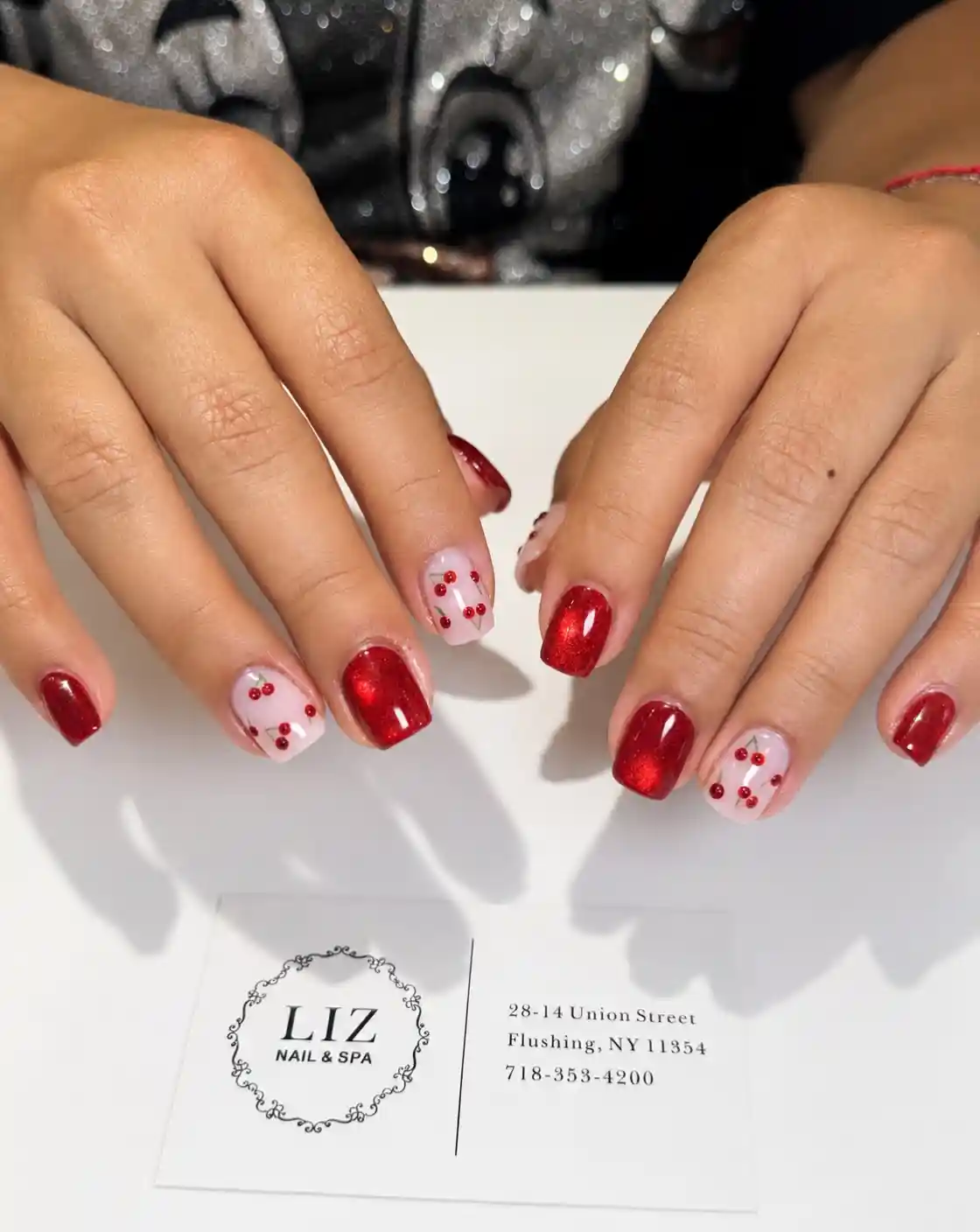 Red shimmer and pale pink set with red dot-and-line motifs
