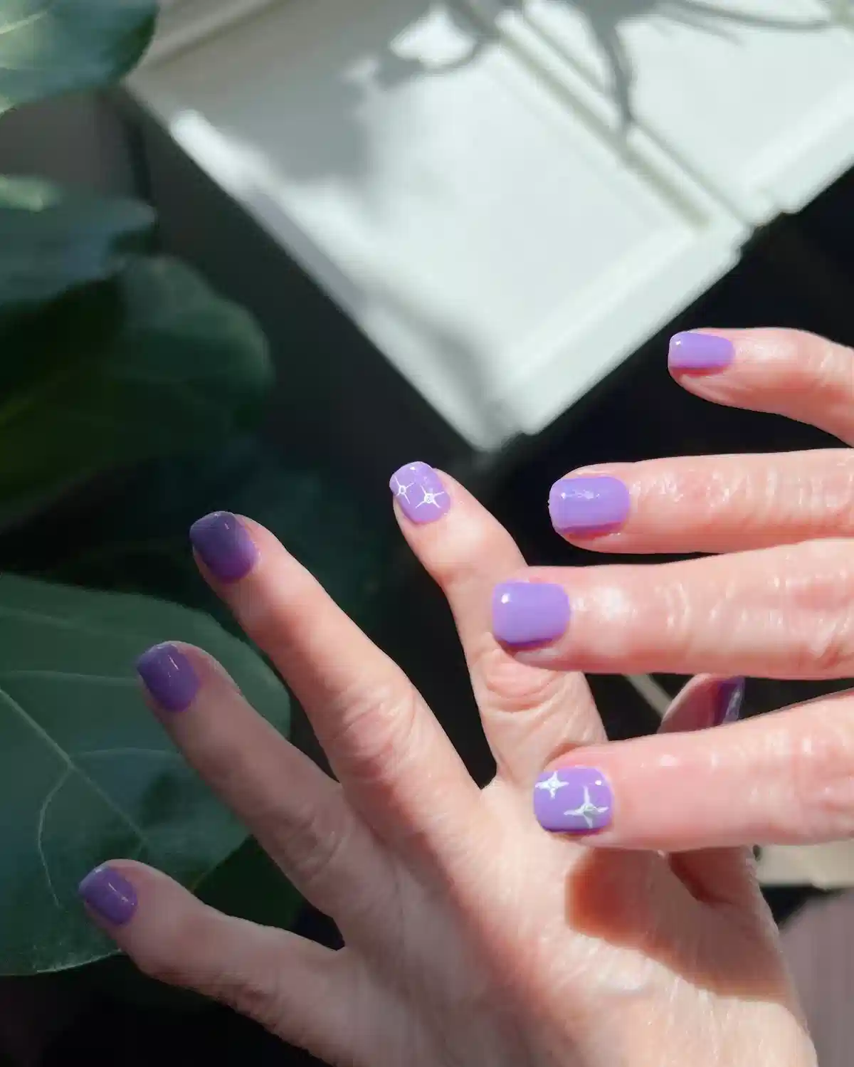 Lavender short nails with tiny white sparkles