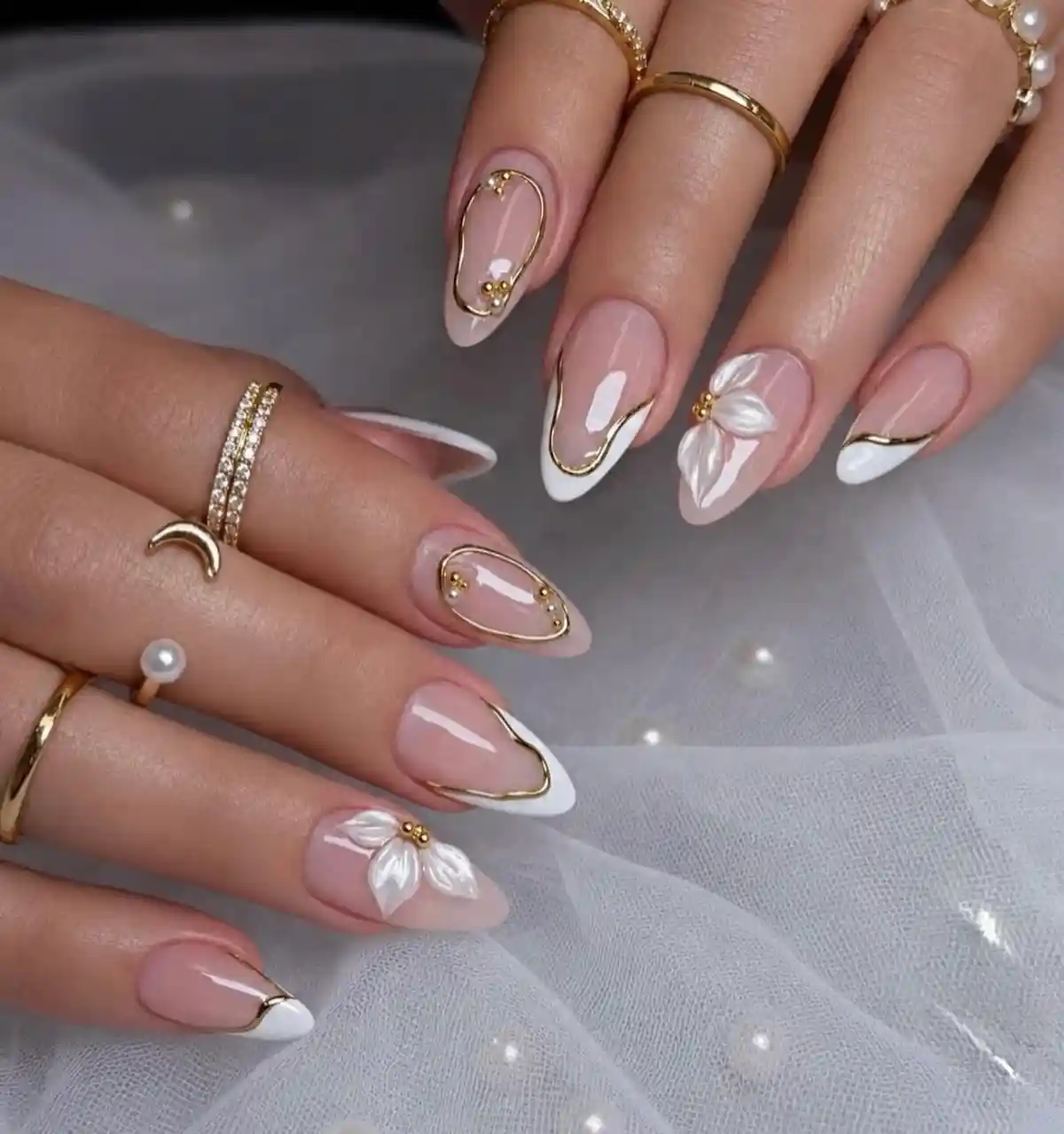 Gold-outlined French tips with white 3D flowers