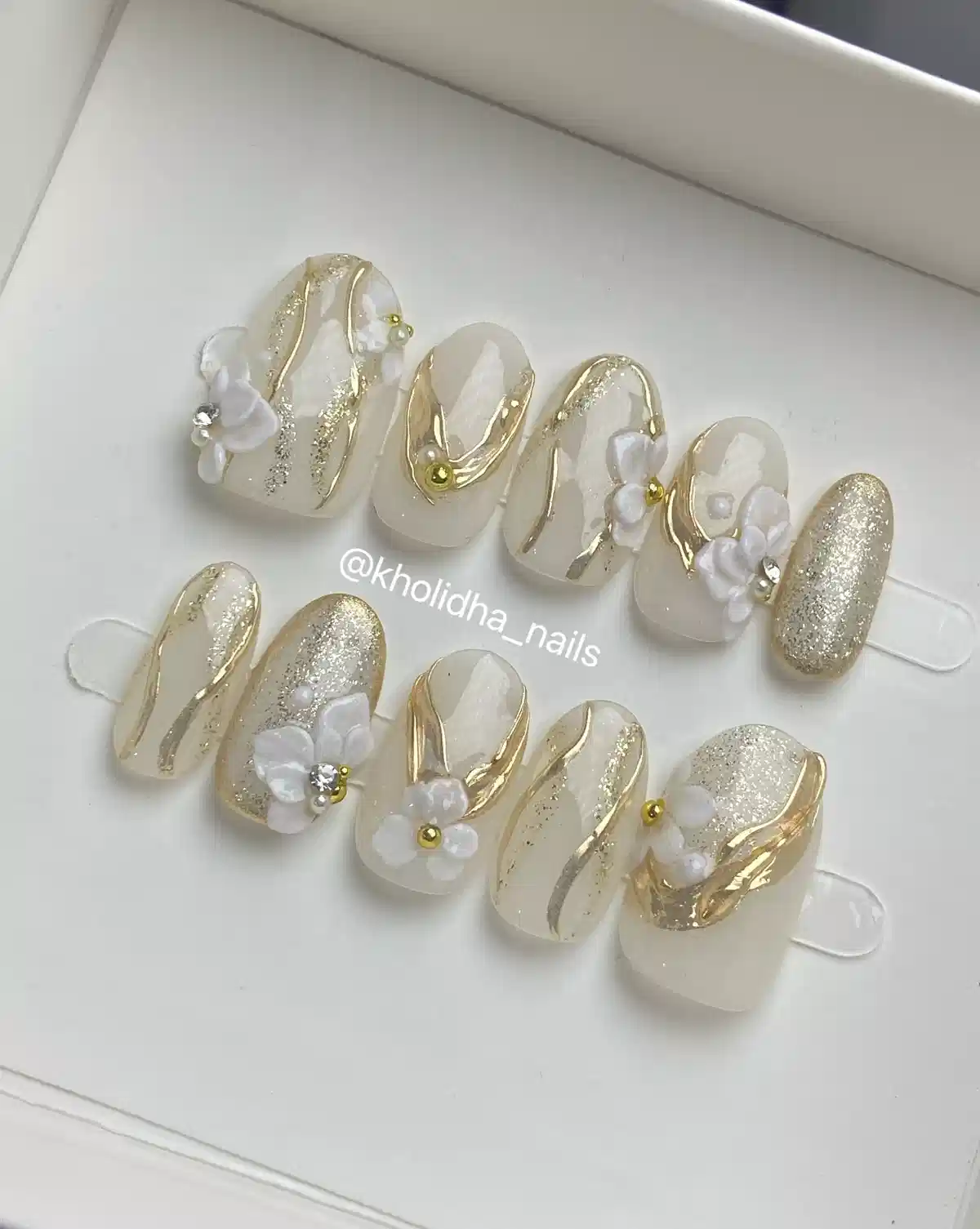 Milky white set with gold waves, glitter, and 3D flowers