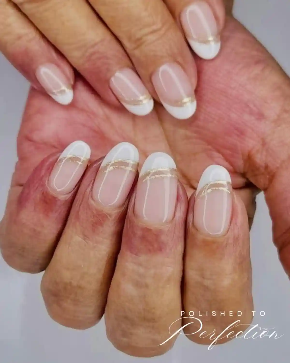 White French tips with thin gold smile line
